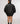 girl wearing the unapologetic unisex back shirt backside view design
