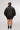 girl wearing the unapologetic unisex back shirt backside view design