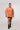 girl wearing brain size of a peanut unisex t-shirt front view