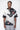 man wearing messy heads iced grey suede unisex t-shirt - front view design