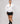 girl wear white color array of thoughts unisex bomber jacket front and full view